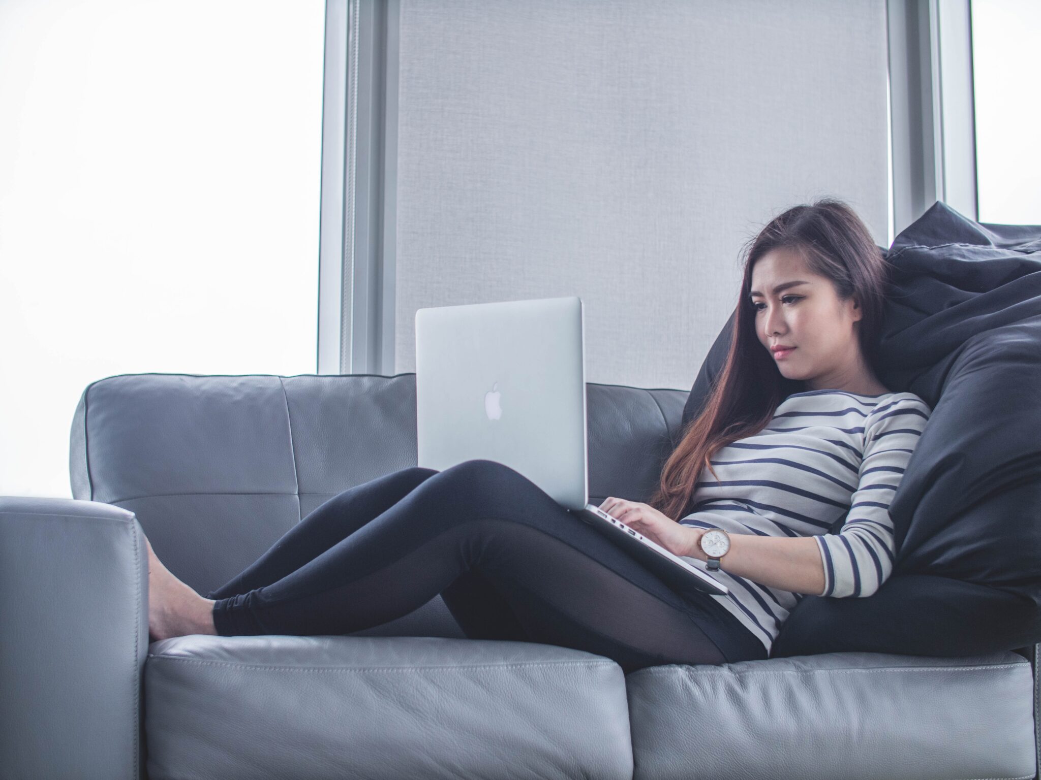 women-working-from-home-on-the-sofa